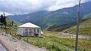 The Village of Xinaliq and Great Caucasus mountains